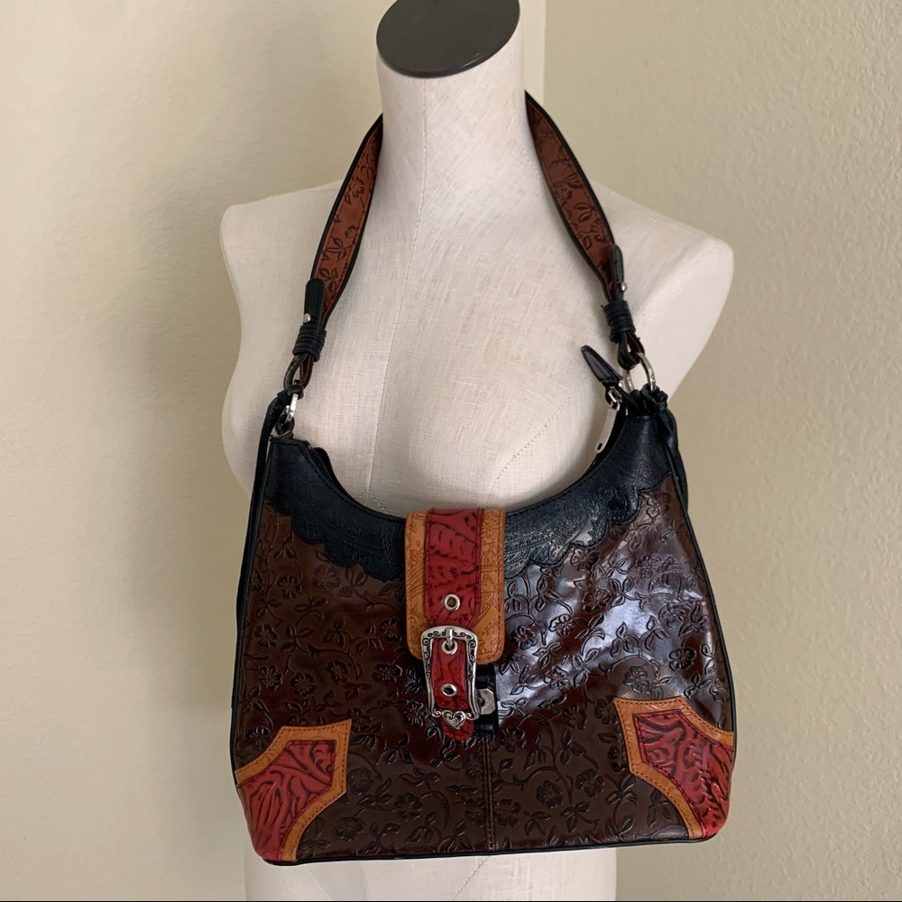 M.C. Hand tooled leather purse